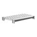 A white plastic shelf with vented shelves.