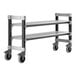 A metal Cambro Camshelving Elements undercounter unit with black and gray metal legs and wheels with two vented shelves.