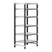 A black Cambro metal shelving unit with four vented shelves.