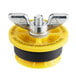 A yellow and black plastic Cherne End of Pipe Gripper Plug with a metal wing.