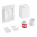 A white plastic box with a red lid and a white lid containing a white plastic Oatey Sure-Vent air admittance valve and a red plastic tube.