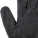 A close-up of a pair of black Cordova Machinist work gloves.
