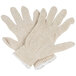 A pair of beige Cordova polyester/cotton work gloves.