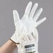 A pair of white Cordova Monarch engineered fiber gloves with white polyurethane palm coating.