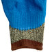 A Cordova small cut-resistant glove with blue latex coating on the palm with a brown and blue knit pattern.