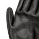 A close-up of a 2X Cordova Monarch green and black cut-resistant glove.