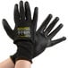 A pair of small black Cordova Monarch work gloves with black polyurethane palms.