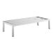 A white metal Regency dunnage rack on metal legs.