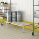 A Regency aluminum dunnage rack on a metal shelf.