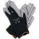 A pair of Cordova black and gray Cor-Touch Lite work gloves on a white background.