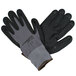 A pair of gray Cordova warehouse gloves with black and gray palm coating and nitrile dots.