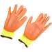 A pair of yellow Cordova warehouse gloves with orange palms.