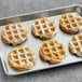 A tray of Swapples vegan gluten-free everything waffles with black and white specks.
