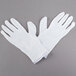 A pair of white Cordova Men's Stretch Nylon Inspector's Gloves.