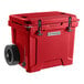 A red CaterGator outdoor cooler with wheels.