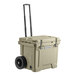 A tan CaterGator outdoor cooler with wheels.