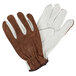 A pair of brown and white Cordova cowhide leather driver's gloves.