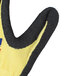 A yellow Cordova warehouse glove with a black and red logo.