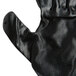 A pair of black Cordova warehouse gloves with black nitrile palms on a white background.