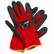 A pair of red and black Cordova iON Flex gloves with dark gray latex palms and yellow trim.