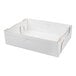 A white corrugated half sheet tray with raised sides and cut-out handles.