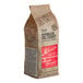 A brown bag of Republica del Cacao Mexico 66% Dark Chocolate Couverture with a red label.