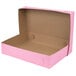 A Baker's Mark pink half sheet cake box with a lid.