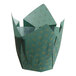 A green paper Baker's Mark tulip baking cup with a gold star pattern.