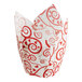 A white and red Baker's Mark tulip baking cup with red swirls and hearts.