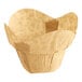 A Baker's Mark unbleached natural Kraft paper cupcake liner with a rounded edge.