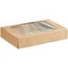 A brown Baker's Mark bakery box with a clear plastic window.