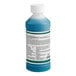 A white plastic bottle of Noble Chemical Strike All Purpose Concentrated Cleaner Degreaser with a blue label.