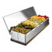 A Pinnacolo 6-compartment condiment bar with a wood base holding fruits and vegetables.