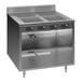 A Spring USA stainless steel slide-in induction cooking cabinet with 4 ranges.