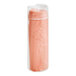 A pink plastic container with a roll of orange fabric inside.