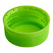 A lime green plastic bottle cap.