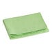 A stack of folded green Lavex Super-Absorbent Lime Cooling Towels on a white background.