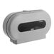 A grey Lavex VersaHub automatic double roll toilet tissue dispenser with black and white text.