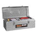 A metal box with a General Pipe Cleaners Mini-Jet Electric Water Jetter Set inside.