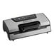 A silver and black Galaxy vacuum packaging machine with a roll holder and cutter.