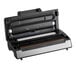 A Galaxy vacuum sealer with a roll of vacuum sealer bags and a roll holder.