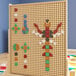 A Flash Furniture multi-color peg board with colorful pieces on it.