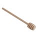 A Fox Run wooden honey dipper with a wooden handle.