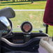 A Mr. Heater portable liquid propane golf cart heater attached to a golf cart.