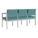 A row of three Lesro Lenox blue vinyl chairs.