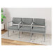 A Lesro Lenox steel sofa with center arms in gray fabric sitting on a wooden floor.