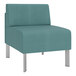 A teal Lesro Luxe Lounge chair with silver legs.