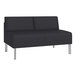 A Lesro Luxe Lounge Series black vinyl loveseat with steel legs.