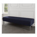 A navy blue Lesro Luxe Lounge bench with metal legs.