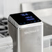 A silver VacPak-It Sous Vide immersion circulator head with a digital display.